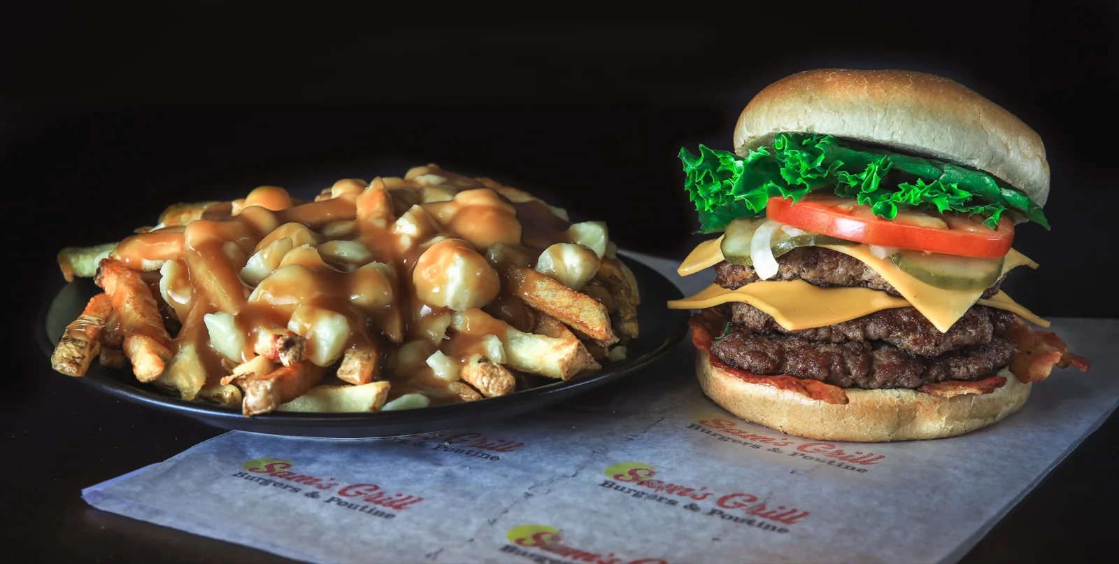 A Sam's Grill burger, fresh-cut fries and poutine served on Sam's Grill branded paper